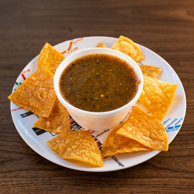 House Roasted Red Salsa & Hand-Cut Chips.